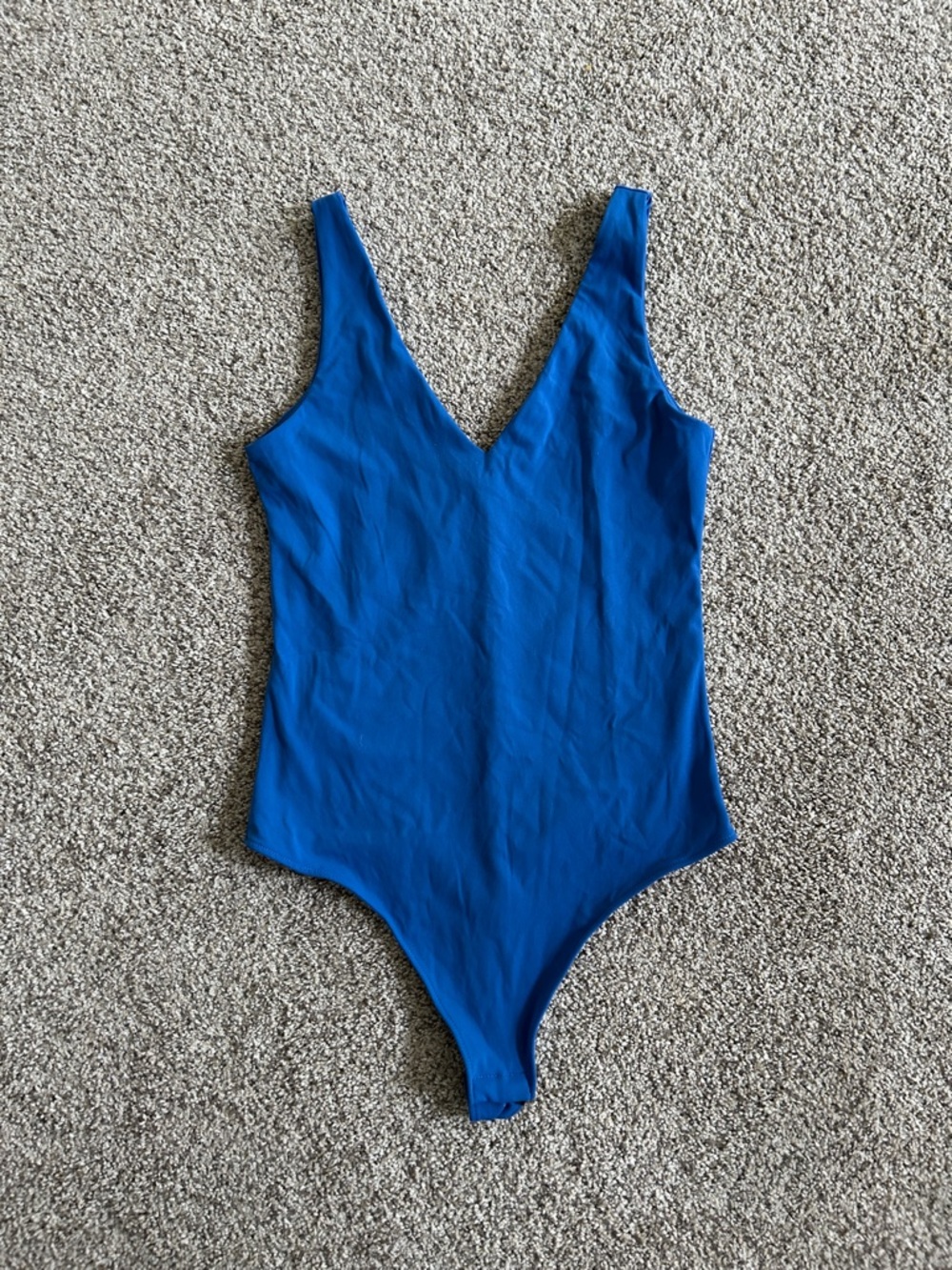 Sleek V-Neck Royal Blue One-Piece Bodysuit